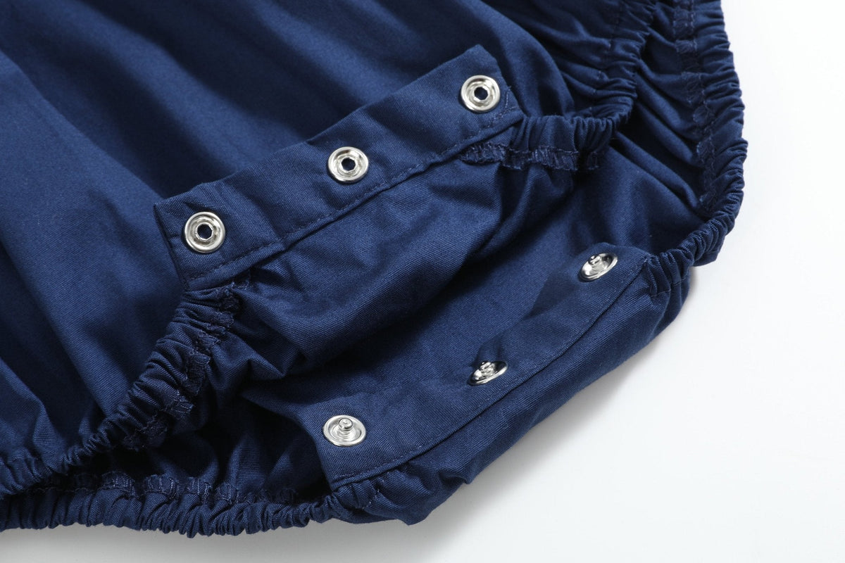 Blue Nativity Smocked Ruffle Romper